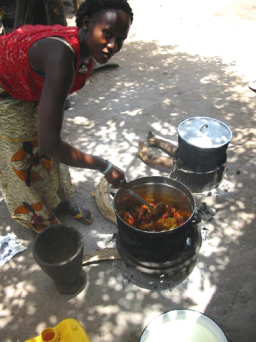 african woman cooking